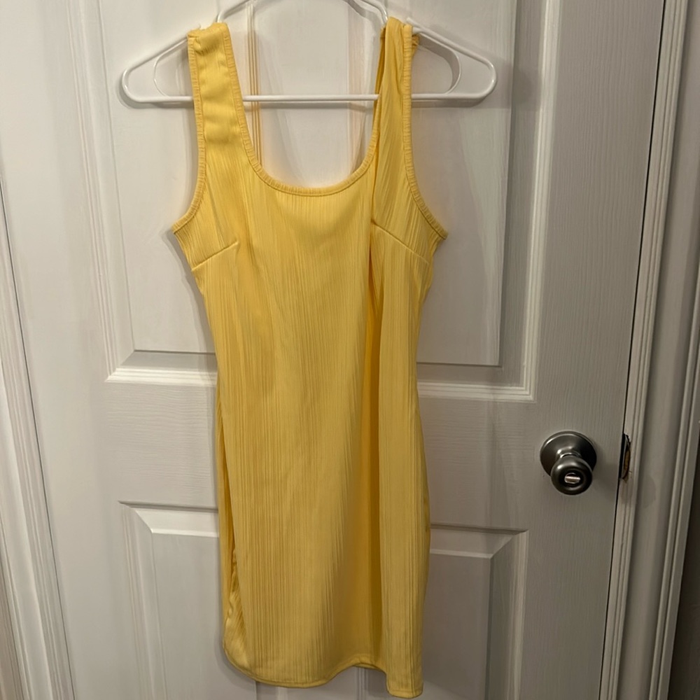 brand new yellow dress with cute cutout in the back